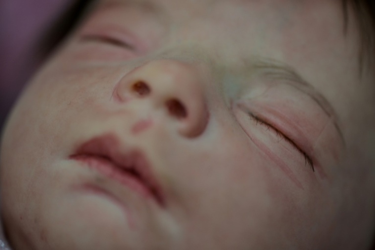 Le visage d'un "bébé reborn" au magasin "Maternité Alana Babys" à Campinas, dans l'Etat de Sao Paulo, le 16 mai 2025 au Brésil ( AFP / Nelson ALMEIDA )
