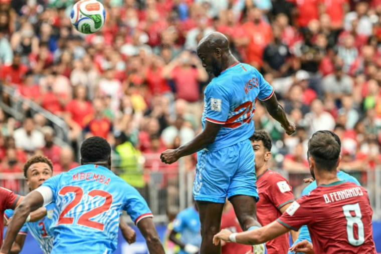 Yoane Wissa marque de la tête lors du match du Mondial entre la RD Congo et le Portugal, le 17 juin 2026 à Houston ( AFP / RONALDO SCHEMIDT )