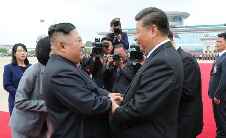 Kim Jong Un et Xi Jinping à Pyongyang, le 21 juin 2019 ( KCNA VIA KNS / STR )