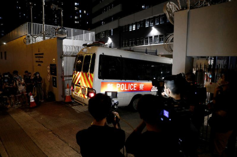 HONG KONG: LA POLICE ARRÊTE QUATRE PERSONNES DANS LE CADRE DE LA LOI SÉCURITAIRE