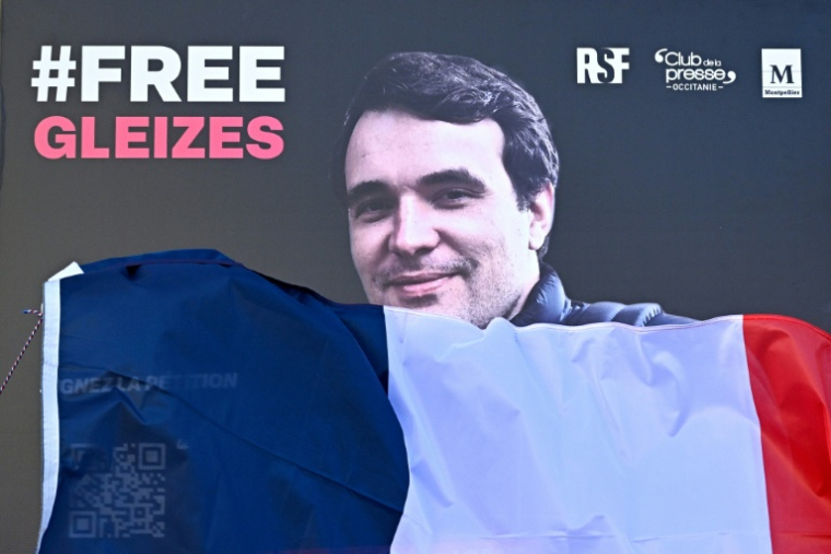 Un portrait du journaliste sportif Christophe Gleizes, détenu en Algérie, le 29 janvier 2026 à Montpellier ( AFP / Gabriel BOUYS )