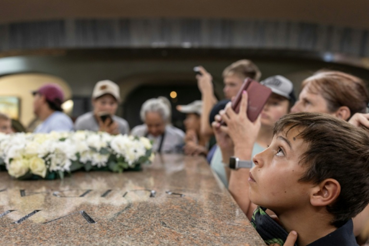 Des Afrikaners sont rassemblés pour célébrer le Jour du serment, au monument des Voortrekkers à Pretoria (Afrique du Sud), le 16 décembre 2025 ( AFP / Wikus de Wet )