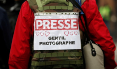 Un photographe de presse lors d'une manifestation