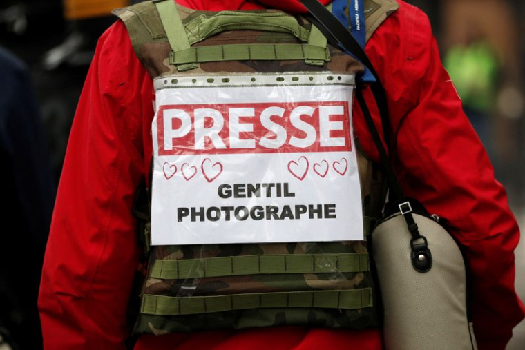 Un photographe de presse lors d'une manifestation