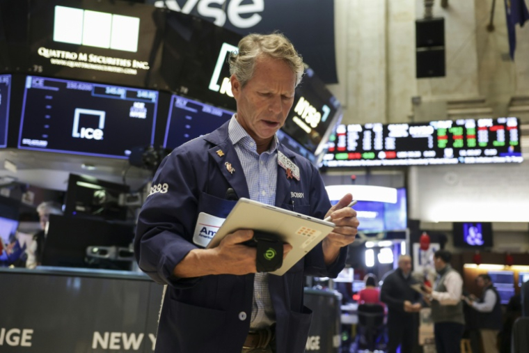 Un opérateur à la Bourse de New York le 30 octobre 2025 ( AFP / ANGELA WEISS )