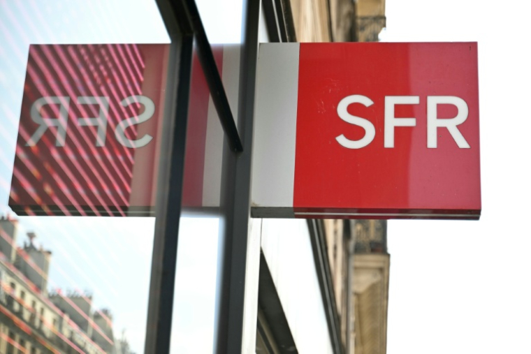 L'accord officialisé en avril prévoit une répartition de la valeur de la plupart des actifs de SFR entre Bouygues Telecom, Iliad et Orange ( AFP / EMMA DA SILVA )
