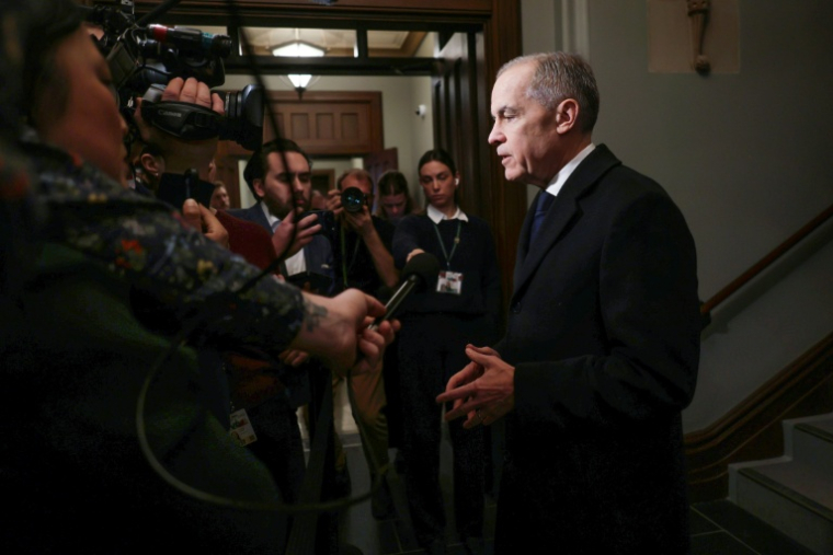 Mark Carney à Ottawa, le 11 février 2026 ( AFP / Dave Chan )