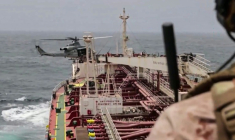 Des soldats américains travaillent au blocus des ports iraniens, selon une capture réalisée le 26 juillet d'une vidéo diffusée le 25 juillet par l'armée américaine (Centcom) ( US Central Command (CENTCOM) / - )