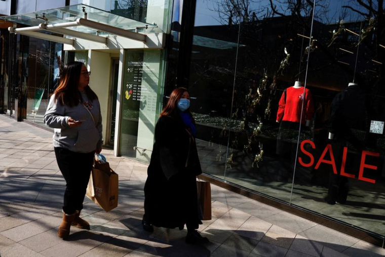 Des consommateurs à Pékin