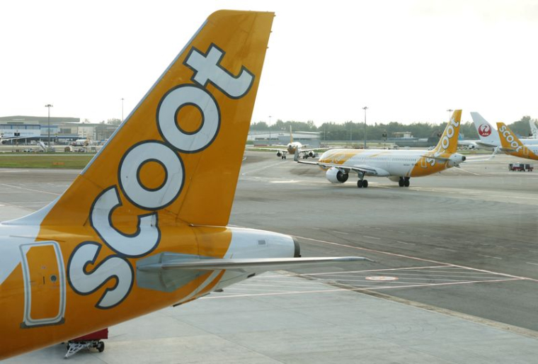 Vue des avions de Scoot à l'aéroport de Changi, à Singapour