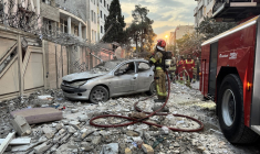 Des secouristes à Téhéran, en Iran, le 13 juin 2025. ( TASNIM NEWS / MEGHDAD MADADI )