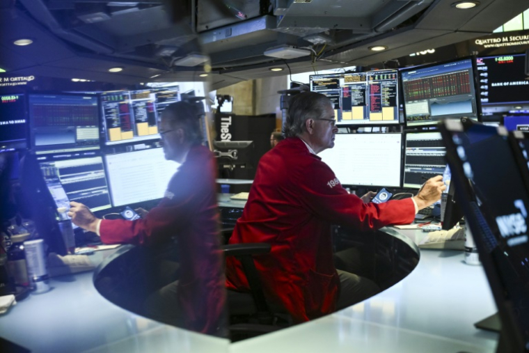 Un opérateur à la Bourse de New York, le 13 juin 2025 ( AFP / ANGELA WEISS )