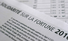 Le mécanisme du plafonnement permet d’éviter qu’un redevable ne paie un montant d’impôts supérieur à 75% de ses revenus. (© D. Meyer / AFP)