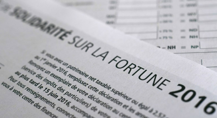 Le mécanisme du plafonnement permet d’éviter qu’un redevable ne paie un montant d’impôts supérieur à 75% de ses revenus. (© D. Meyer / AFP)