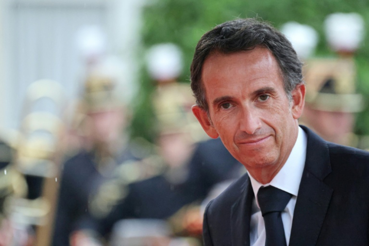 Le PDG du groupe français Carrefour, Alexandre Bompard, arrive au palais de l'Elysée, à Paris, le 5 juin 2025 ( AFP / Ludovic MARIN )