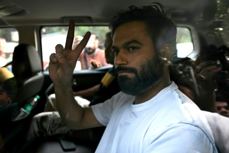 Le fondateur du Parti du peuple des cafards (CJP), Abhijeet Dipke, remis en liberté, le 17 octobre 2026 à New Delhi, en Inde  ( AFP / Arun SANKAR )
