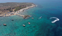 People enjoy the sea at the Palm Islands Nature Reserve in Lebanon