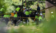 Des membres d'une équipe de secours dans la mine d'or où 23 mineurs sont restés coincés, le 24 septembre 2025 à Segovia (département d'Antioquia), au nord-ouest de la Colombie ( AFP / Jaime Saldarriaga )