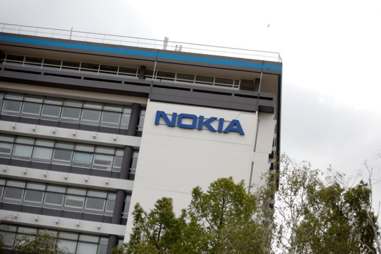 NOKIA GRIMPE EN BOURSE APRÈS UNE HAUSSE SURPRISE DU BÉNÉFICE AU DEUXIÈME TRIMESTRE