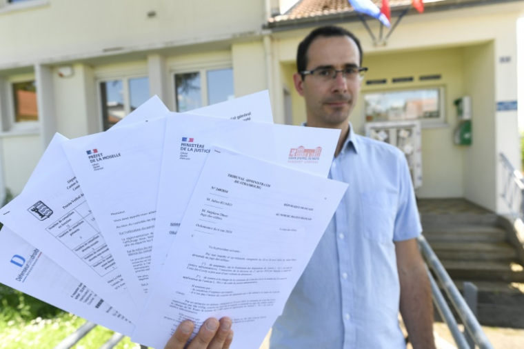 Julien Ruaro, victime d'une fausse lettre de démission de son mandat de conseiller municipal de Coin-les-Cuvry en Moselle le 24 juin 2024 ( AFP / Jean-Christophe Verhaegen )