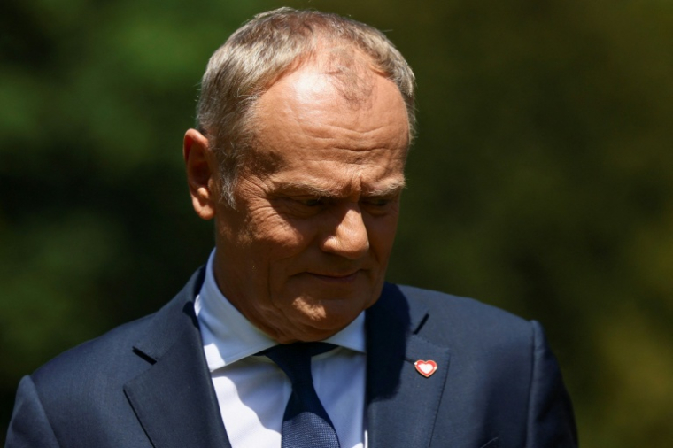 Le Premier ministre polonais Donald Tusk assiste à une cérémonie à Uxbridge, dans l'ouest de Londres, le 27 mai 2026 ( POOL / Jack Taylor )