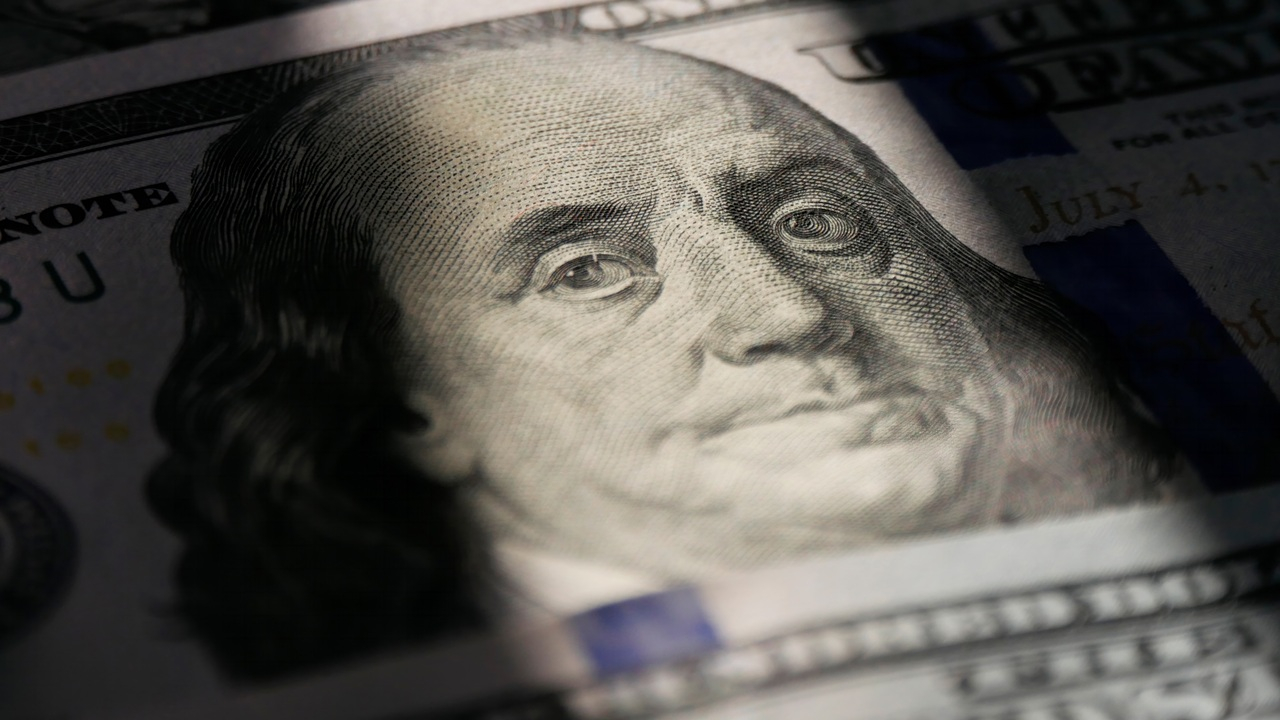L'effigie de Benjamin Franklin sur un billet de 100 dollars. (Crédits: Adobe Stock)