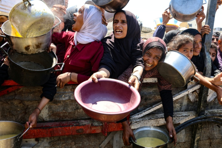 Distribution de nourriture à Gaza-ville, le 2 août 2025 ( AFP / Omar AL-QATTAA )