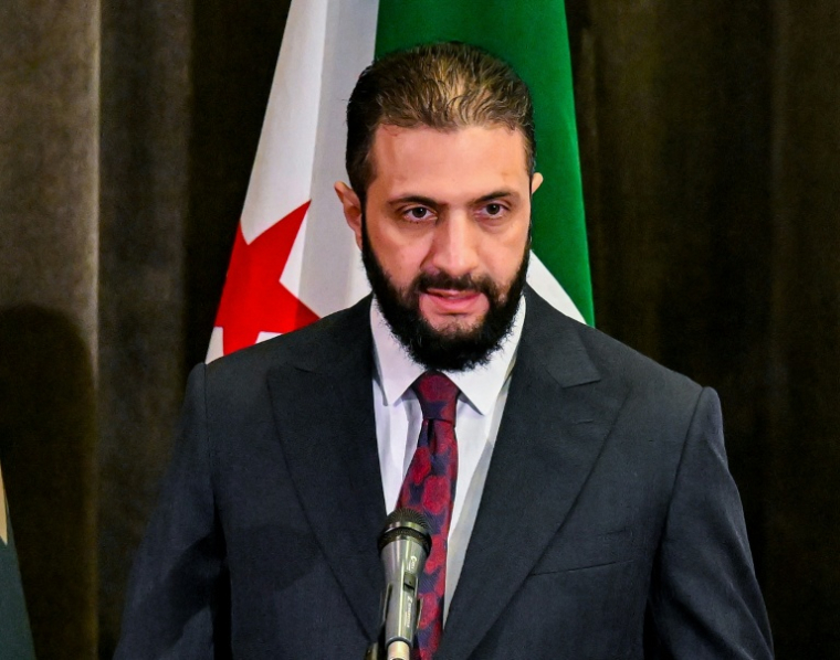 Le président intérimaire Ahmad al-Chareh, le 5 octobre 2025 à Damas, en Syrie ( AFP / LOUAI BESHARA )