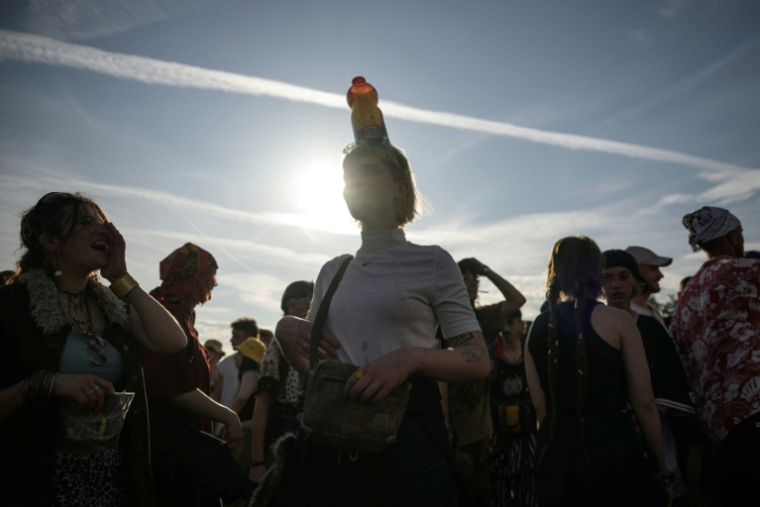 Des participants à une rave party illégale à Montvalent, dans le Lot, le 9 mai 2025 ( AFP / Ed JONES )