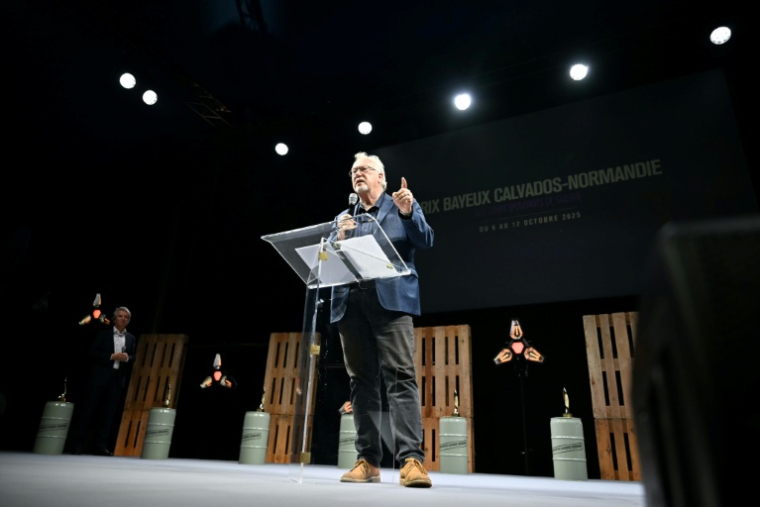 L'auteur américain Jon Lee Anderson, président du jury de la 32e édition du Prix Bayeux, à Bayeux (Calvados), le 11 octobre 2025 ( AFP / Lou BENOIST )