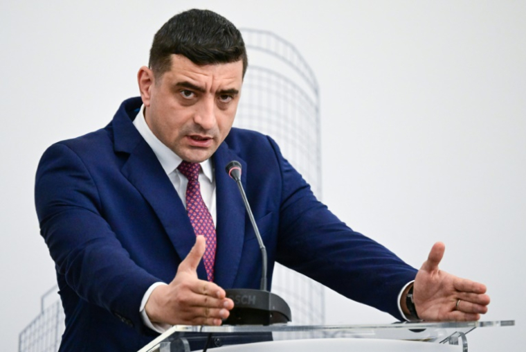 Le candidat nationaliste à la présidence roumaine George Simion, le 13 mai 2025 à Bucarest ( AFP / Daniel MIHAILESCU )