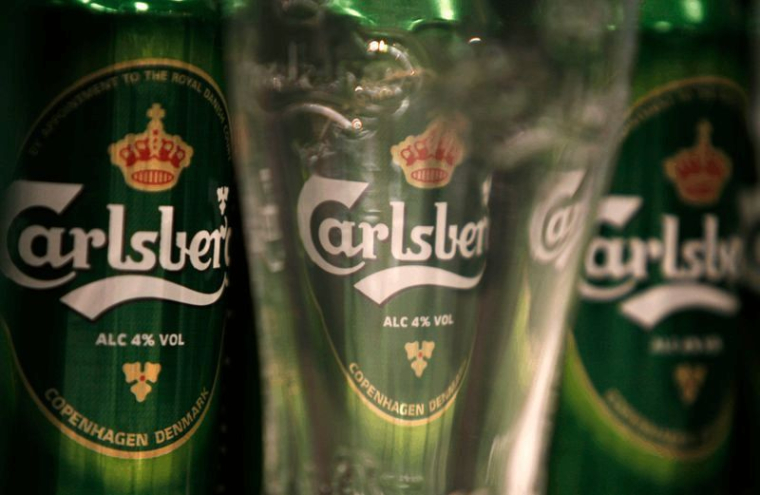 CARLSBERG A LIMITÉ LES DÉGÂTS AU PREMIER SEMESTRE, LE TITRE GRIMPE
