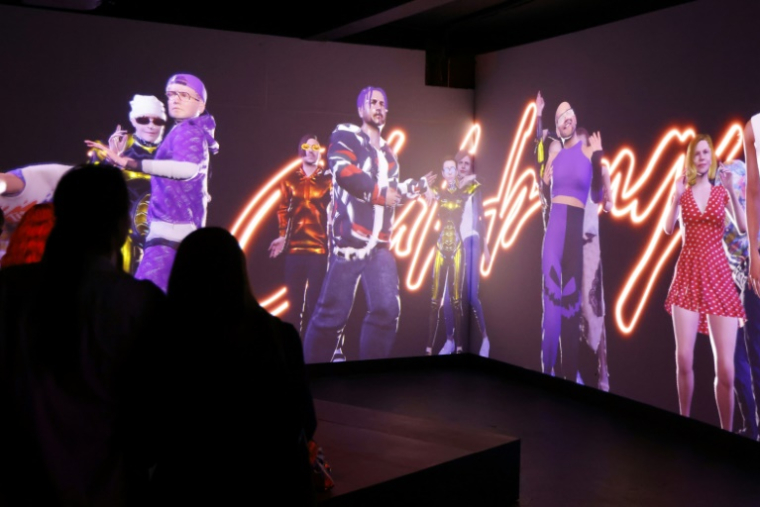 Des visiteurs à l'exposition "Clubbing" au Grand palais immersif à Paris, le 12 mai 2025 ( AFP / Ludovic MARIN )