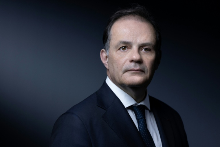 Emmanuel Moulin lors d'une séance photo le 31 mars 2005 à Paris ( AFP / JOEL SAGET )