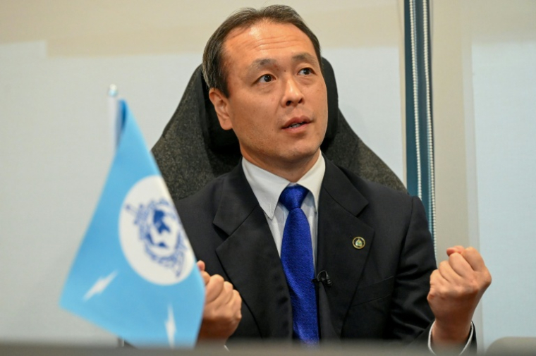 Le chef du Centre d'innovation de l'agence Interpol, Toshinobu Yasuhira, le 29 janvier 2026 à Singapour ( AFP / Roslan RAHMAN )