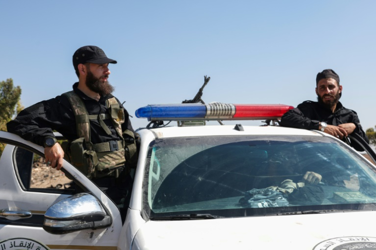 Des membres des forces de sécurité syriennes se déploient dans Walgha, près de Soueida, le 19 juillet 2025 ( AFP / OMAR HAJ KADOUR )
