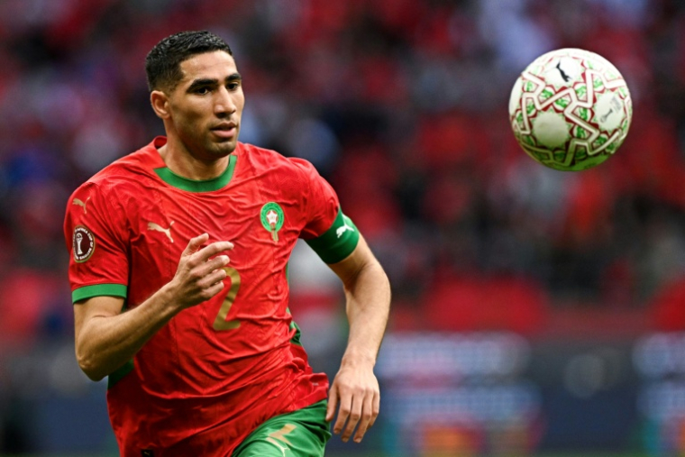 Le latéral et capitaine du Maroc Achraf Hakimi contre la Tanzanie en 8es de finale de la Coupe d'Afrique des nations le 4 janvier 2026 à RAbat ( AFP / Gabriel BOUYS )