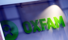 Logo d'Oxfam sur une librairie de Glasgow le 10 février 2018 ( AFP / Andy Buchanan )