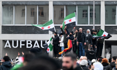 Des membres de la communauté syrienne à Berlin, en Allemagne, le 8 décembre 2024. ( AFP / RALF HIRSCHBERGER )