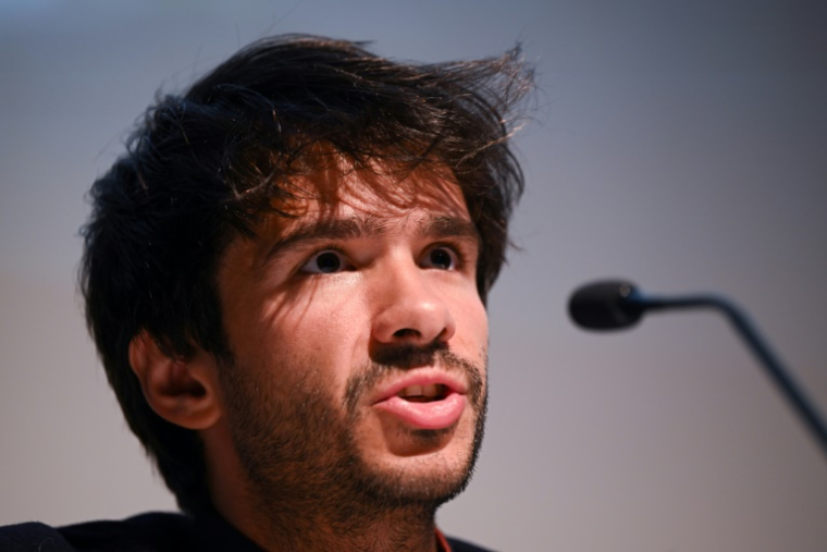 L'avocat Juan Branco, lors d'une conférence de presse, le 22 juin 2023 à Paris ( AFP / Stefano RELLANDINI )