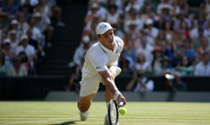 Le Britannique Arthur Féry en quarts de finale de Wimbledon contre l'Italien Flavio Cobolli le 8 juillet 2026 à Londres ( AFP / Henry NICHOLLS )