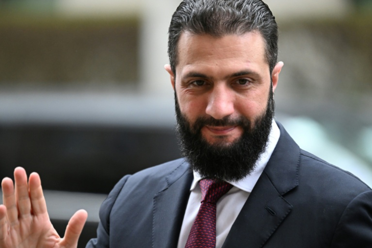 Le président syrien Ahmed al-Chareh, le 30 mars 2026, à Berlin en Allemagne ( AFP / RALF HIRSCHBERGER )