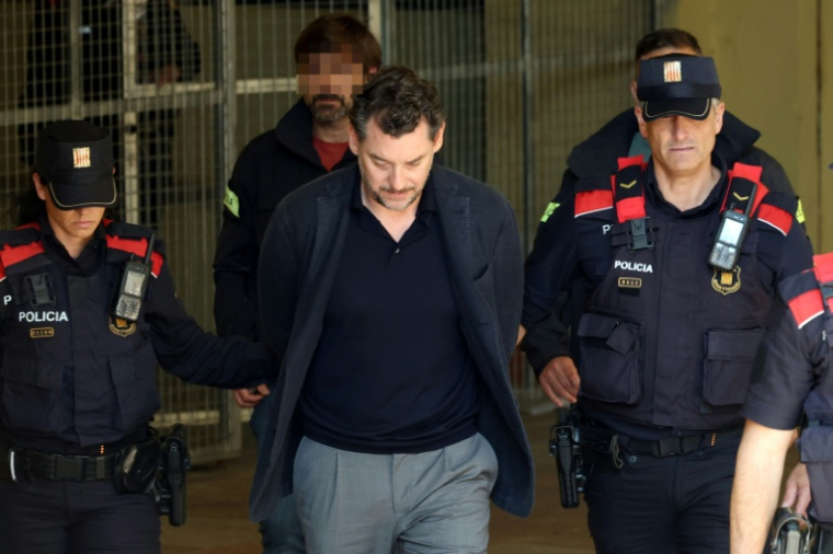 Jonathan Andic sous escorte policière à Martorell près de Barcelone en Espagne le 19 mai 2026 ( AFP / Lluis GENE )